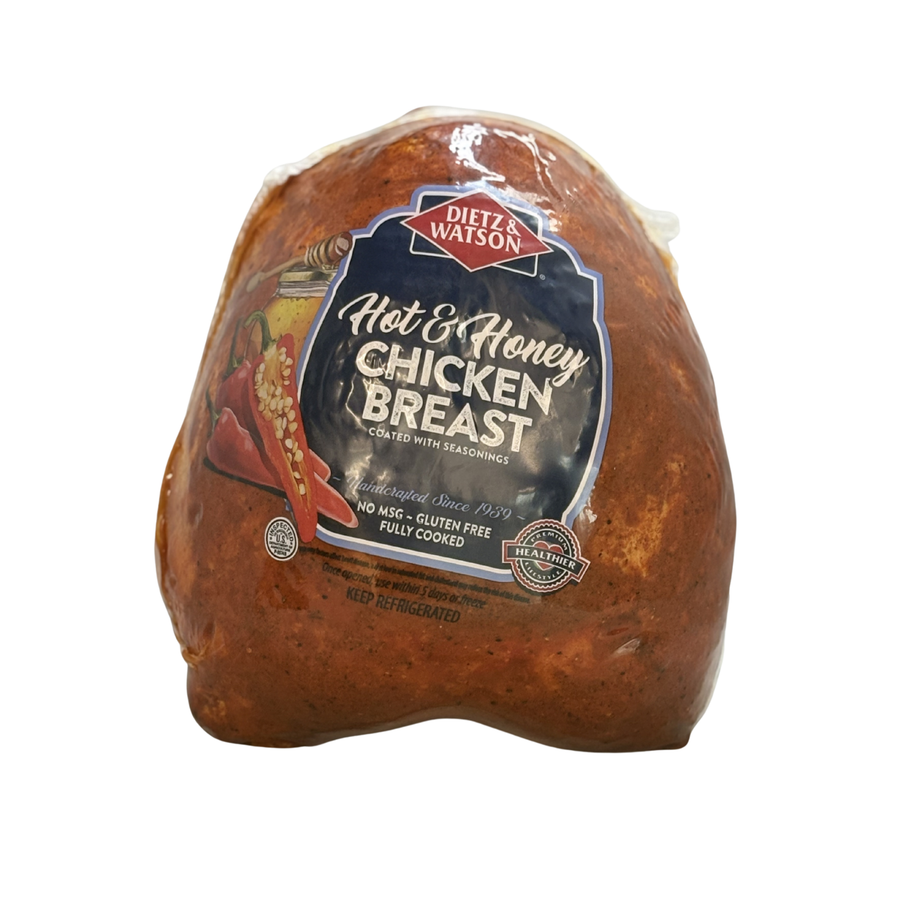 Hot honey chicken breast deli meat in packaging on white background